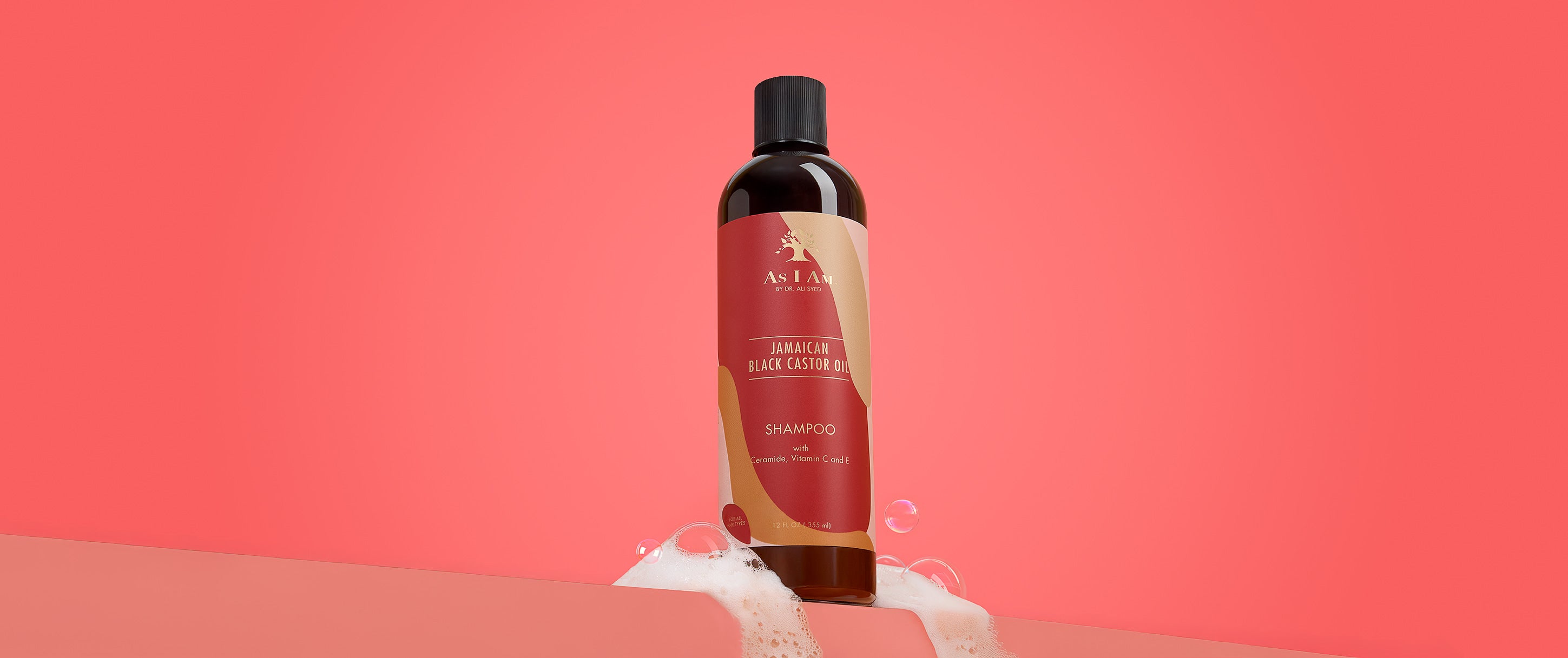 As I Am Jamaican Black Castor Oil Shampoo - Landschaftsbild des nährenden Shampoos, das sanft reinigt, stärkt und das gesunde Haarwachstum unterstützt.