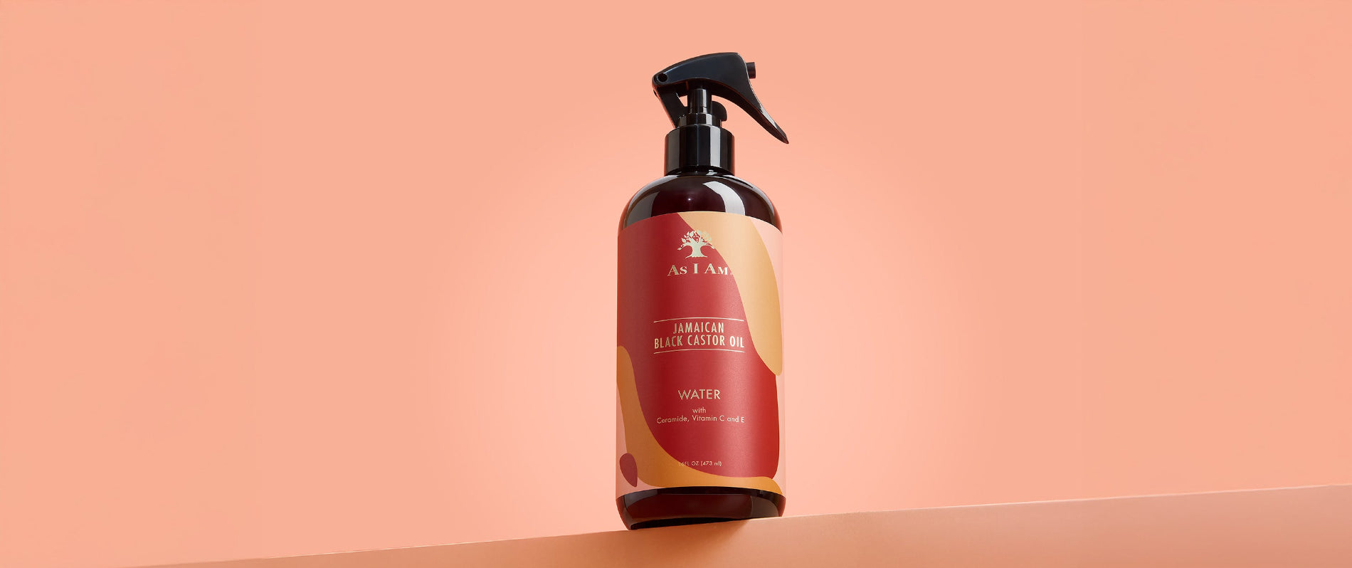 As I Am Jamaican Black Castor Oil Water - Landschaftsbild des feuchtigkeitsspendenden Leave-in-Sprays, das Locken erfrischt, trockenes Haar mit Feuchtigkeit versorgt und gesundes Wachstum mit JBCO unterstützt.