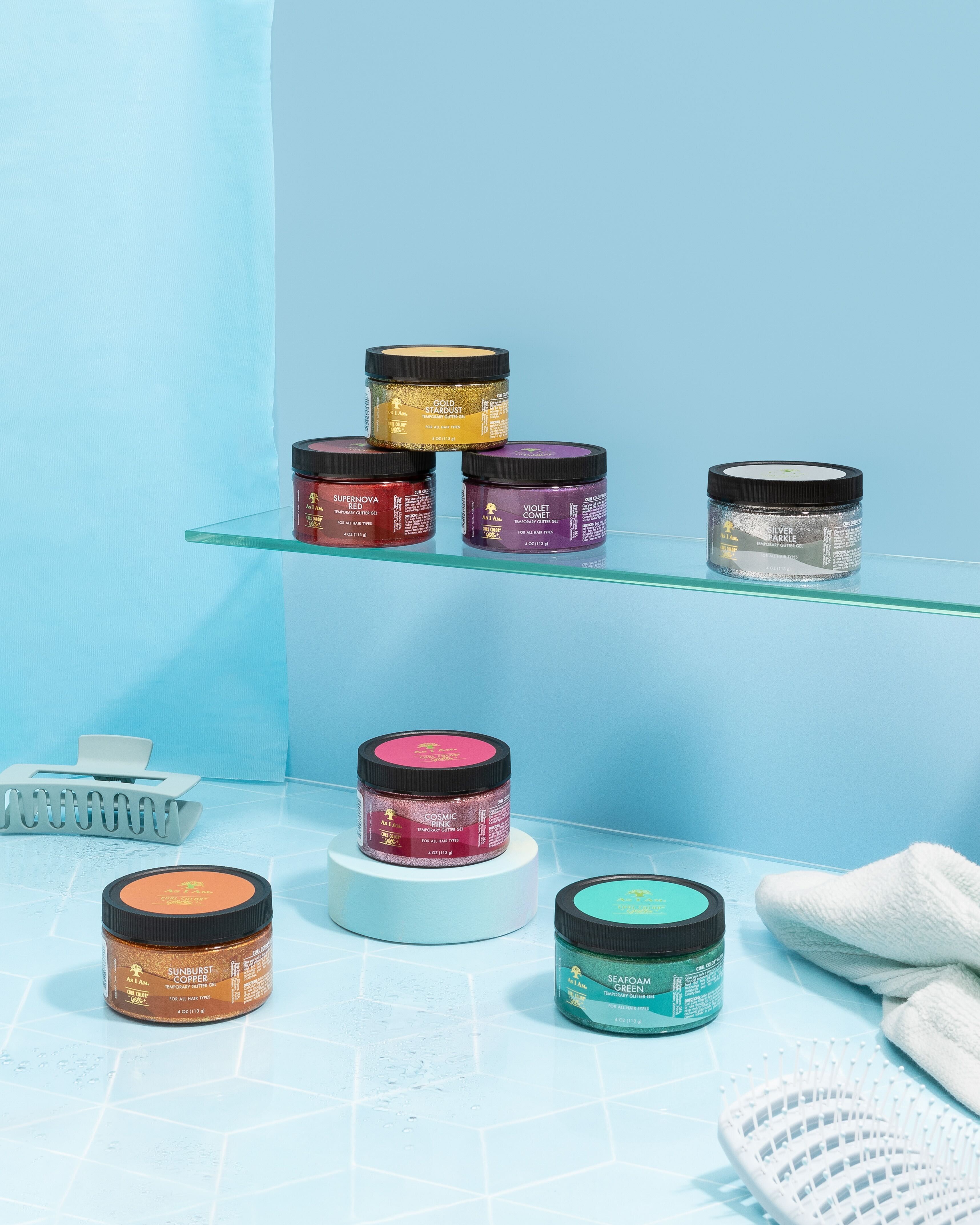 Curl Color Glitter Collection von As I Am, mit leuchtenden temporären Haarfarben mit Glitzer-Finish.